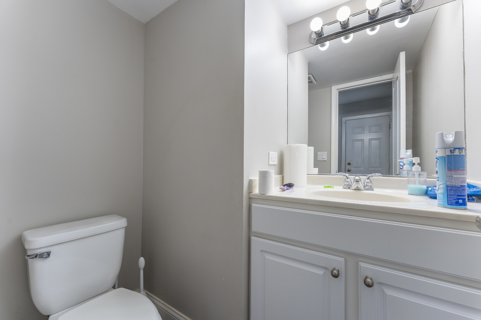 513 Jill Lane Bolingbrook, IL 60440 - Photo 9 of 20 a bathroom with a sink a toilet and mirror