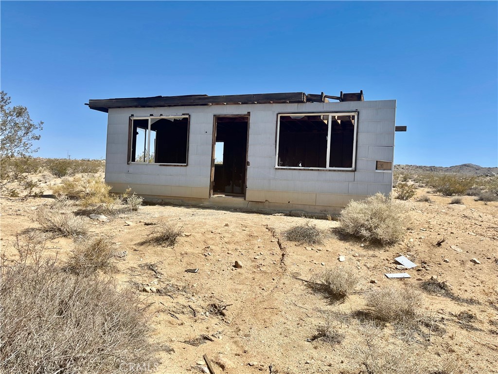0 Quail Bush Road Johnson Valley, CA 92285 - Photo 1 of 1 a front view of a house with a yard
