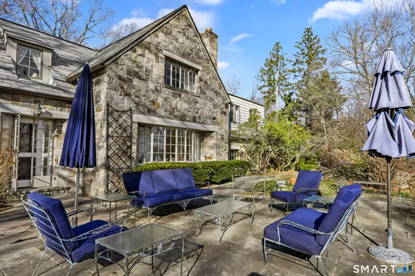 a backyard of a house with seating space