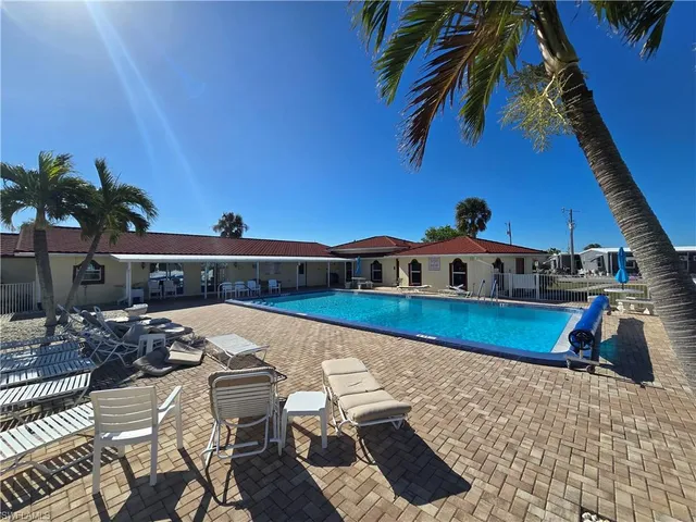 a view of a house with swimming pool