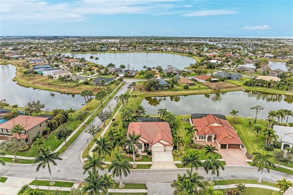 302 Cockle Shell Loop Apollo Beach, FL 33572 - Photo 71 of 75 an aerial view of residential houses with outdoor space