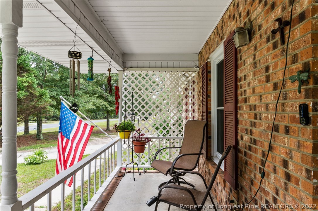15921 Palmer Road Marston, NC 28363 - Photo 17 of 39 a view of balcony with couch