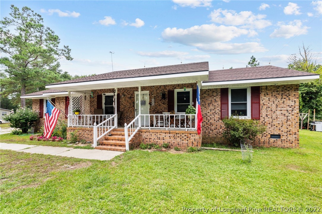 15921 Palmer Road Marston, NC 28363 - Photo 2 of 39 a view of a house with patio