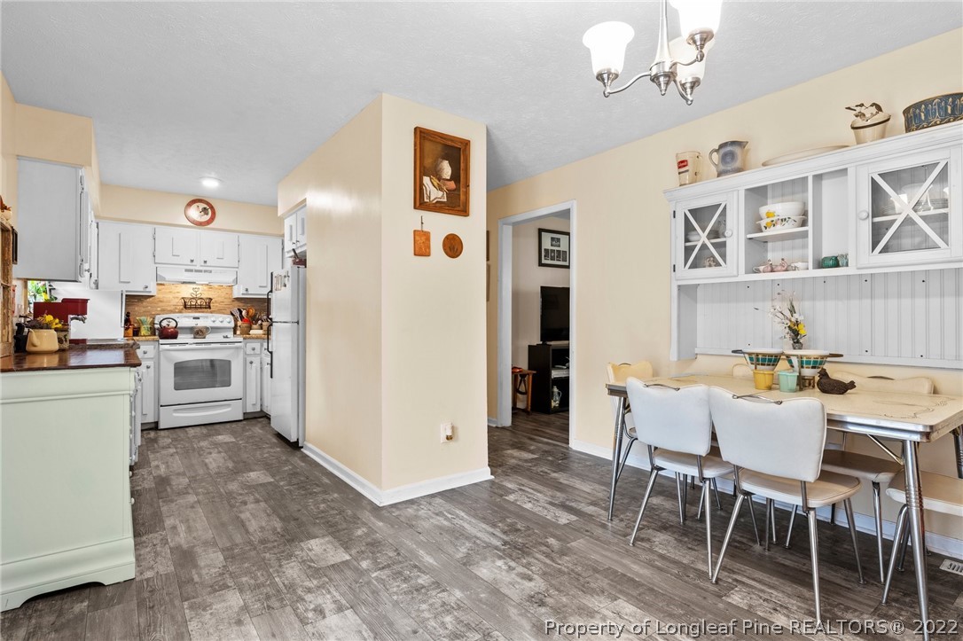 15921 Palmer Road Marston, NC 28363 - Photo 39 of 39 a view of kitchen with furniture and wooden floor