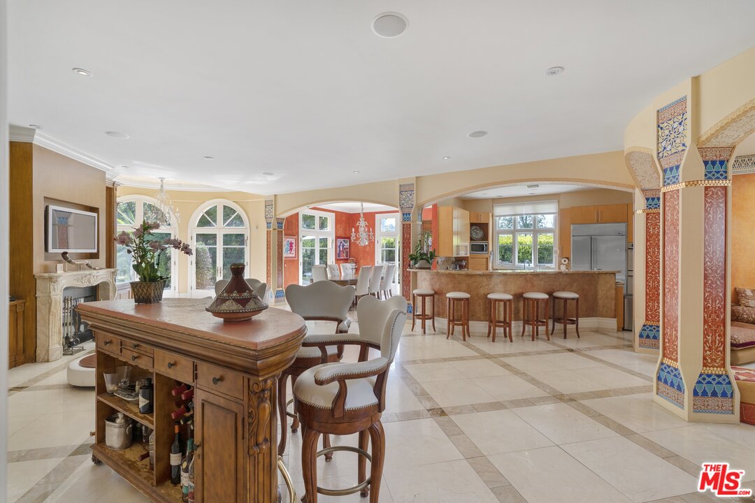 3002 Hutton Place Beverly Hills, CA 90210 - Photo 5 of 9 a view of a dining room with furniture and chandelier