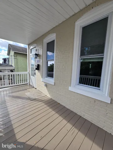 a view of livingroom with wooden floor