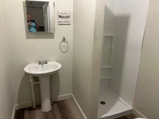 a bathroom with a sink and a mirror