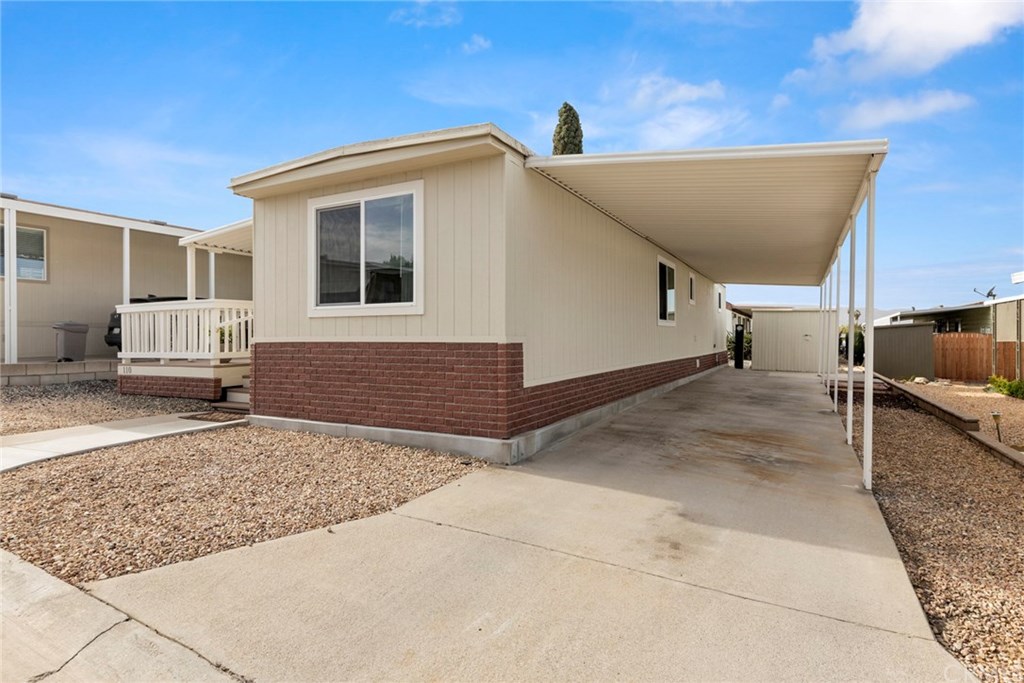 CARPORT WITH PARKING FOR 2 CARS AND SHED