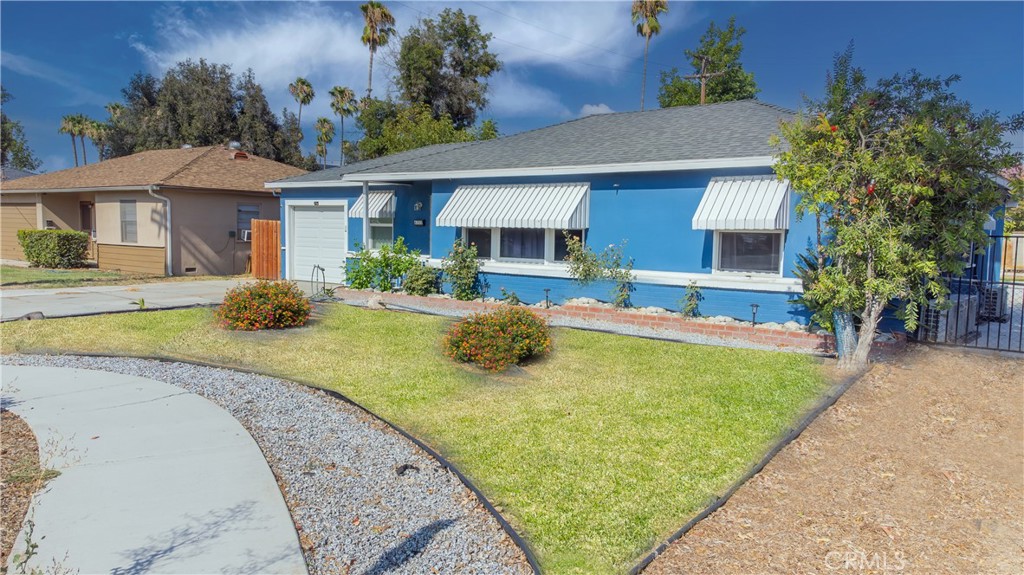 6352 Riverside Avenue Riverside, CA 92506 - Photo 1 of 1 a view of a house with swimming pool and sitting area