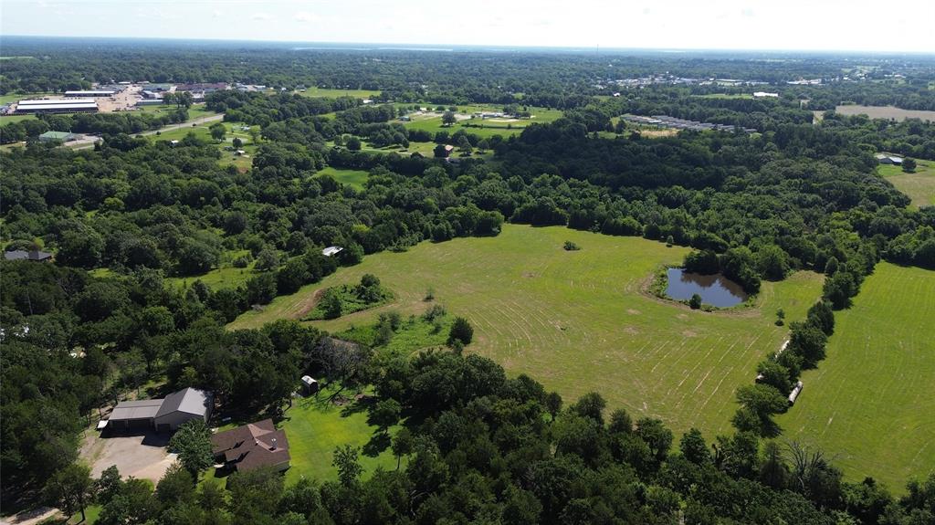 Lot 3 Rains Cr1140 Road Emory, TX 75440 - Photo 4 of 12 an aerial view of residential houses with outdoor space and trees all around