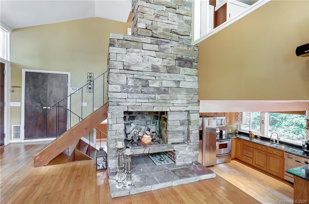 5314 Valley Forge Road Charlotte, NC 28210 - Photo 13 of 48 a living room with furniture and a fireplace