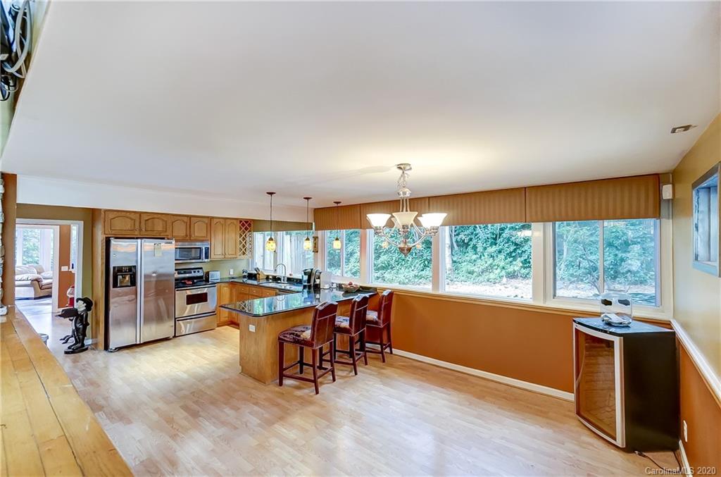 5314 Valley Forge Road Charlotte, NC 28210 - Photo 15 of 48 a view of a dining room with furniture window and outside view