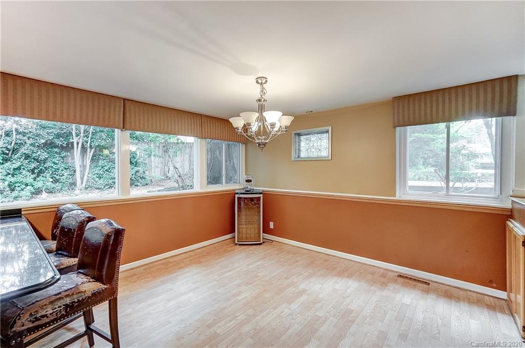 5314 Valley Forge Road Charlotte, NC 28210 - Photo 25 of 48 a view of room with window and wooden floor