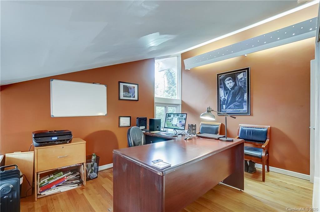 5314 Valley Forge Road Charlotte, NC 28210 - Photo 42 of 48 a work room with furniture and wooden floor