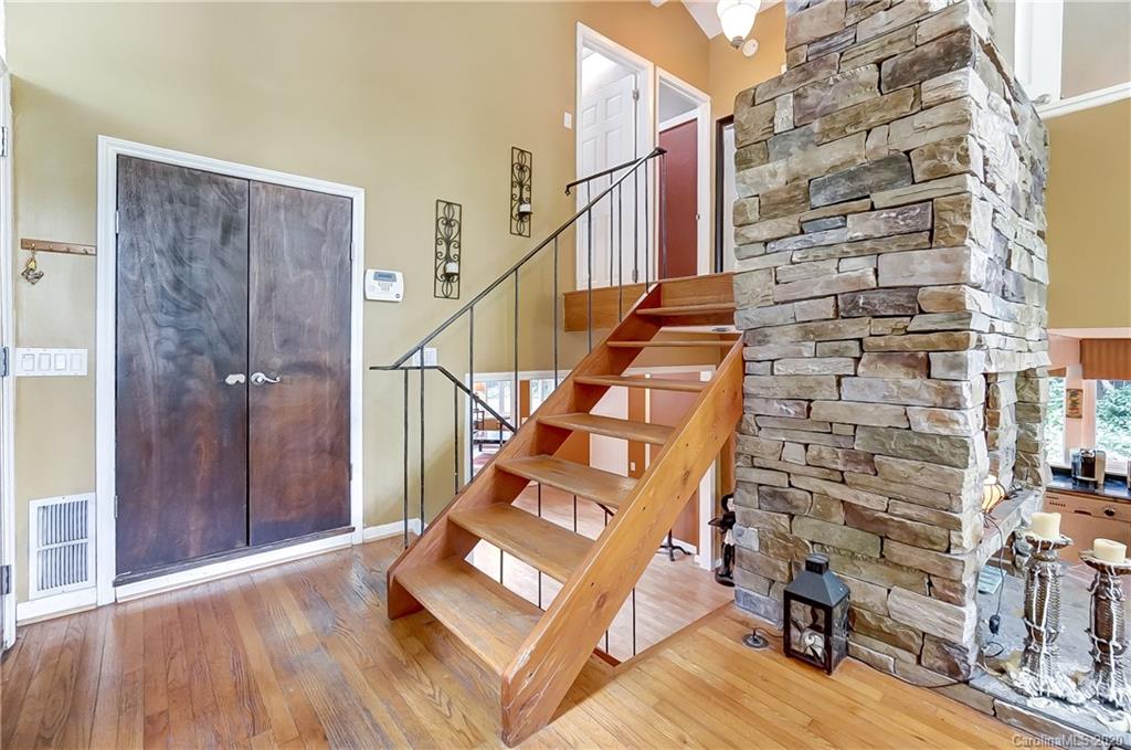 5314 Valley Forge Road Charlotte, NC 28210 - Photo 10 of 48 a view of entryway with wooden floor and stairs