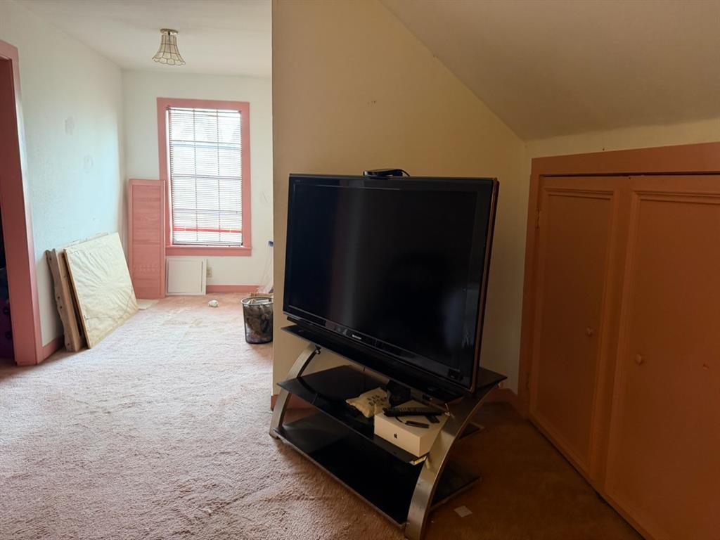 4050 Old Anson Road Abilene, TX 79601 - Photo 24 of 40 a living room with furniture and a flat screen tv