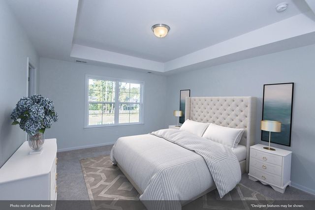 a sign that is sitting on a wooden bench