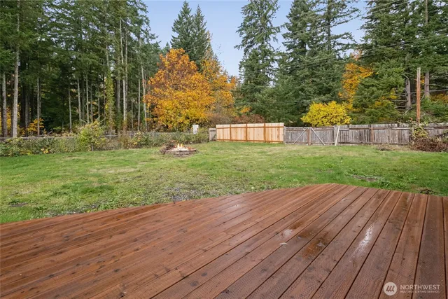 a view of a backyard with wooden floor