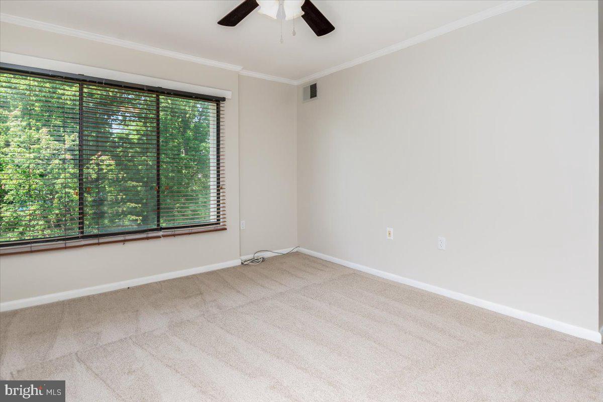 15710 Dorset Road, Unit 302 Laurel, MD 20707 - Photo 23 of 29 Primary Bedroom