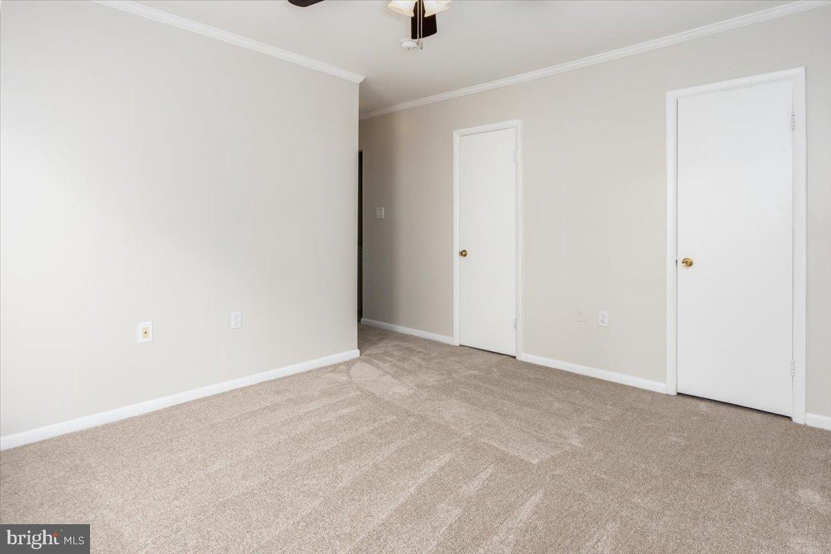 15710 Dorset Road, Unit 302 Laurel, MD 20707 - Photo 24 of 29 Primary Bedroom w/ Dual Walk-In Closets