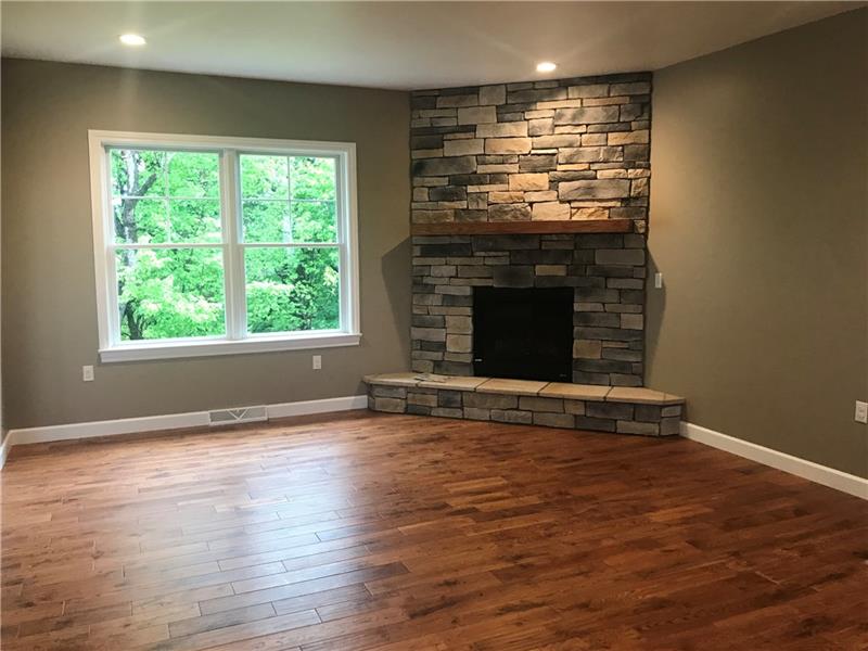 105 Sun Ridge Butler, PA 16001 - Photo 2 of 16 Living room with stone fireplace