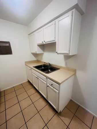 a bathroom with a sink a toilet and a bathtub