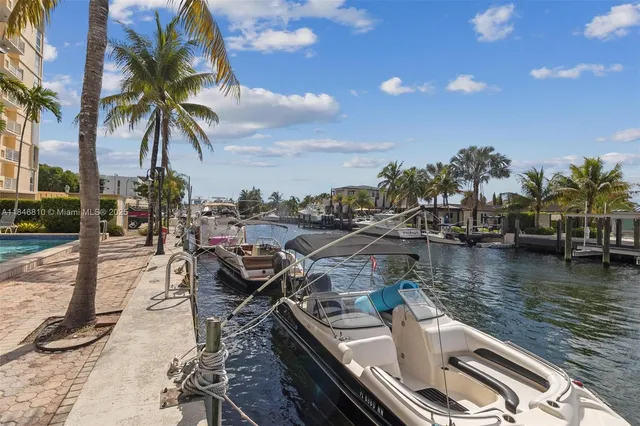 an aerial view of city and lake