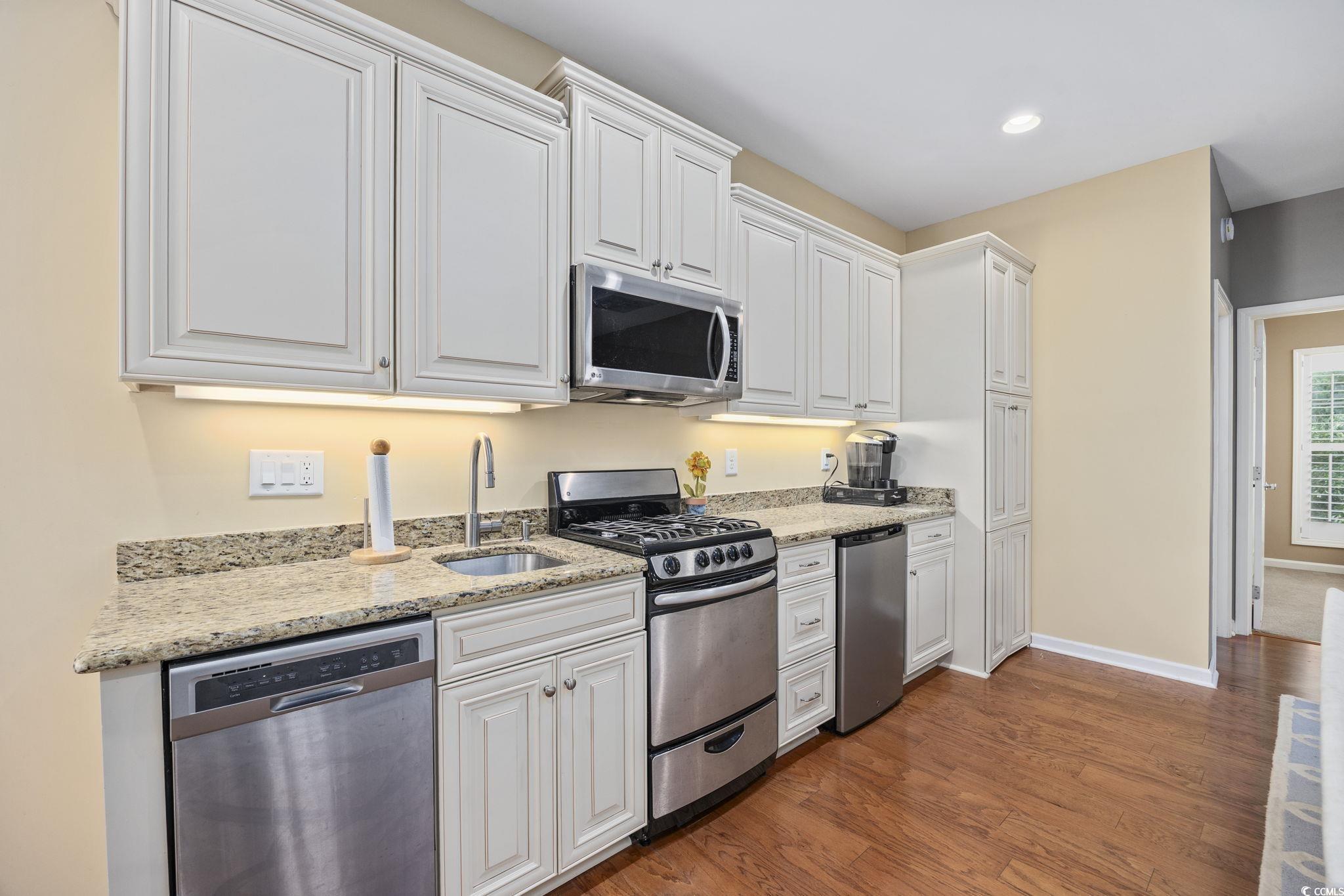 175 SummerWind Loop Murrells Inlet, SC 29576 - Photo 26 of 39 Kitchen featuring stainless steel appliances, a si