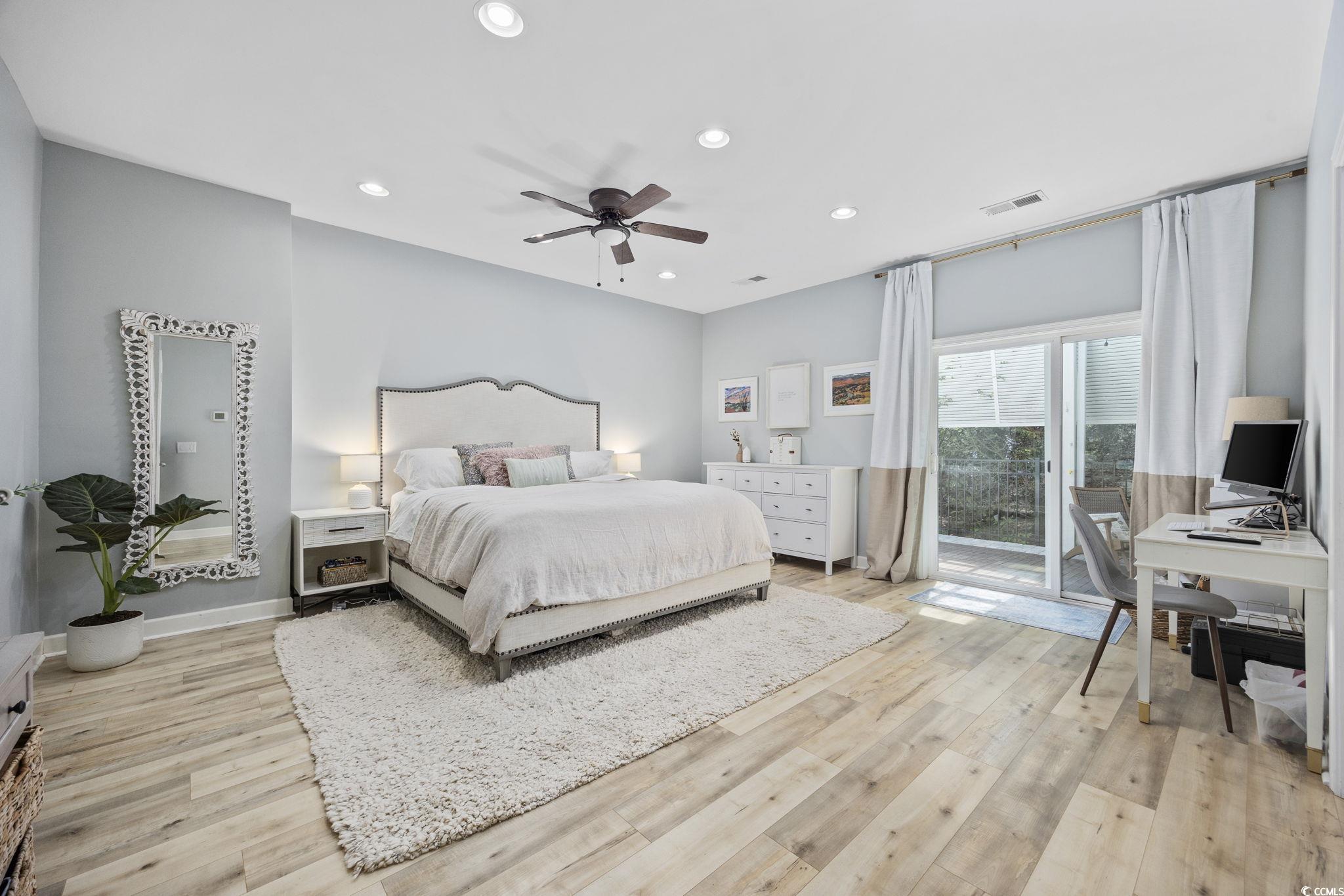 175 SummerWind Loop Murrells Inlet, SC 29576 - Photo 6 of 39 Bedroom featuring access to outside, light wood-st