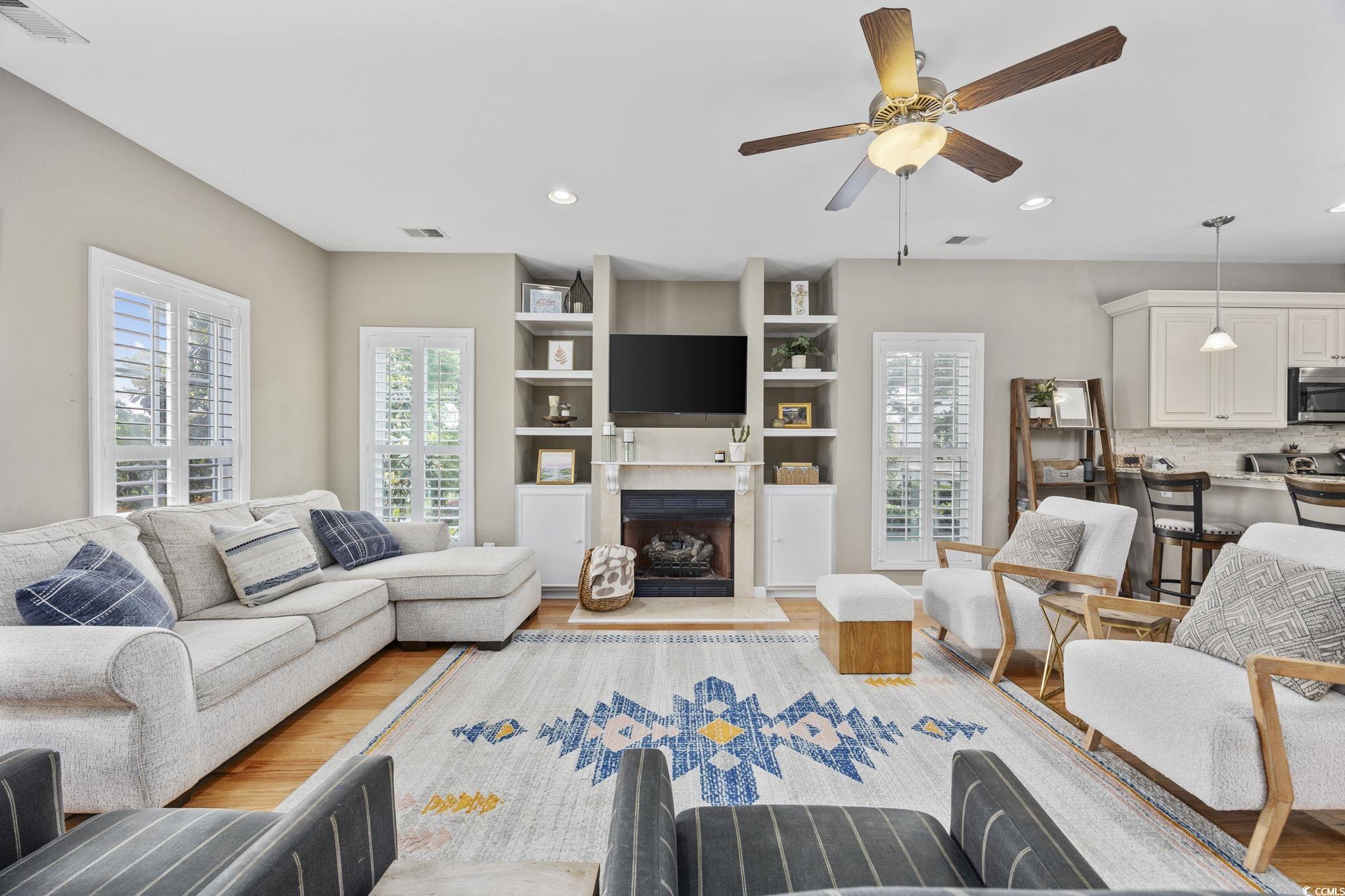 175 SummerWind Loop Murrells Inlet, SC 29576 - Photo 10 of 39 Living area featuring light wood-style floors, rec