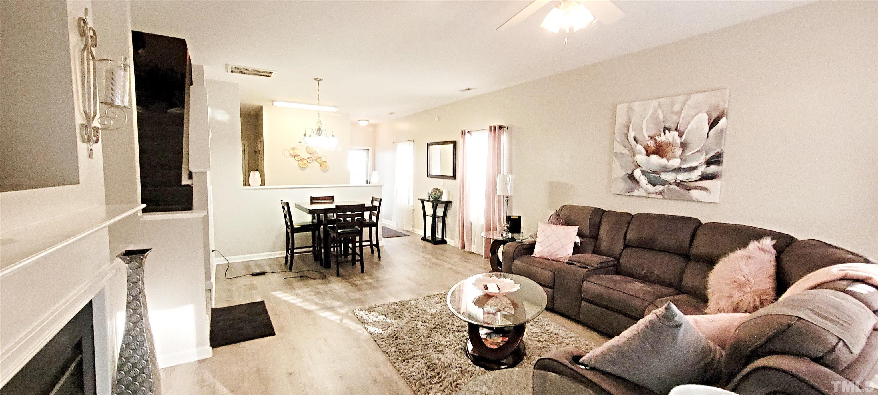 2109 Persimmon Ridge Drive Raleigh, NC 27604 - Photo 12 of 15 a living room with furniture and wooden floor