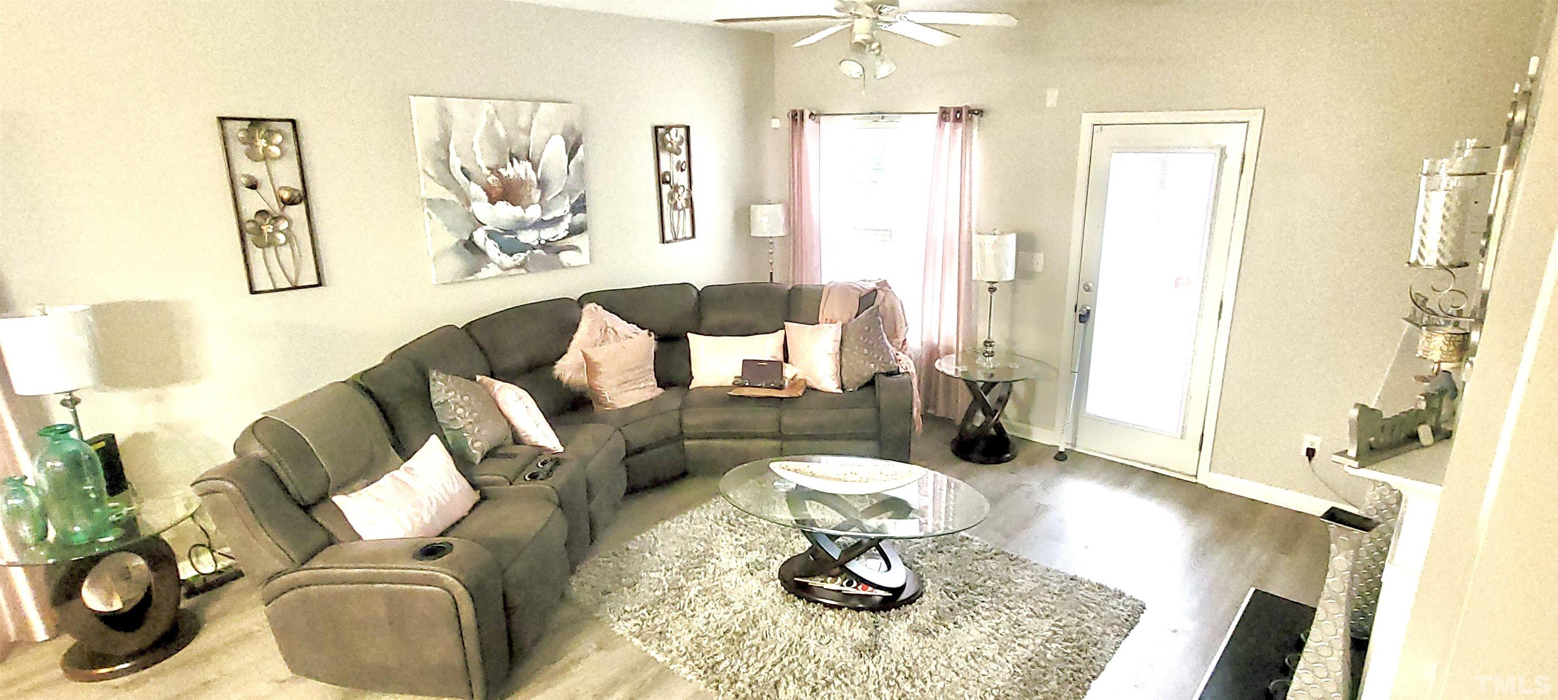 2109 Persimmon Ridge Drive Raleigh, NC 27604 - Photo 3 of 15 a living room with furniture and wooden floor