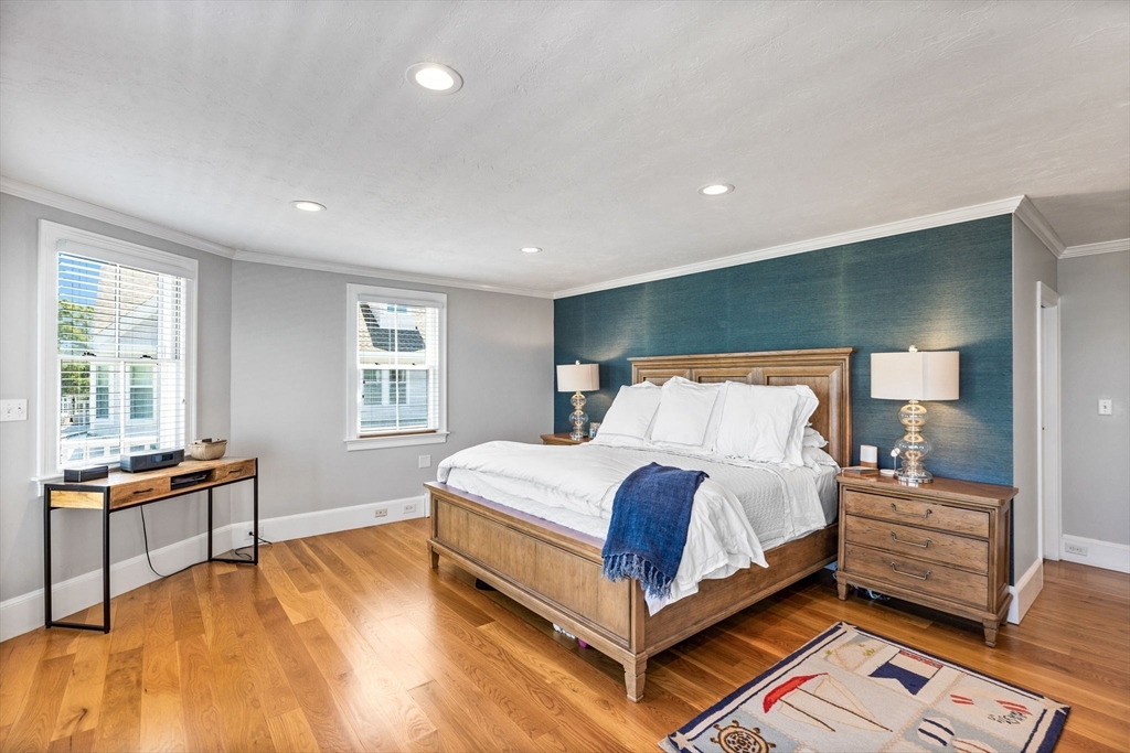 15 Sheldon Road Cohasset, MA 02025 - Photo 26 of 41 a bedroom with a bed and wooden floor