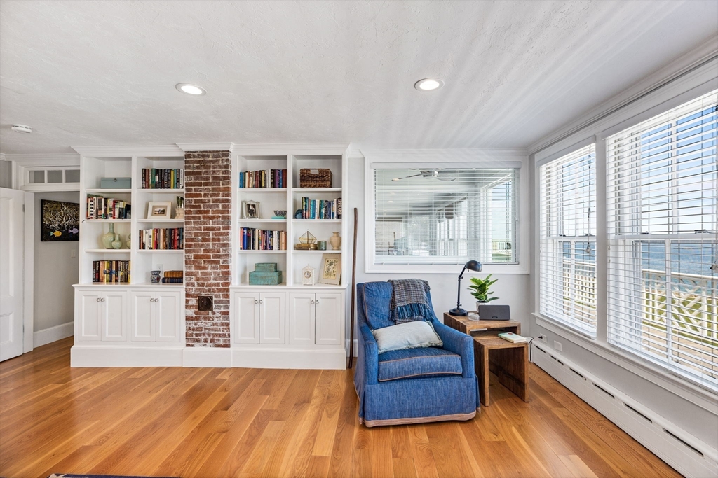 15 Sheldon Road Cohasset, MA 02025 - Photo 27 of 41 a living room with furniture and a large window
