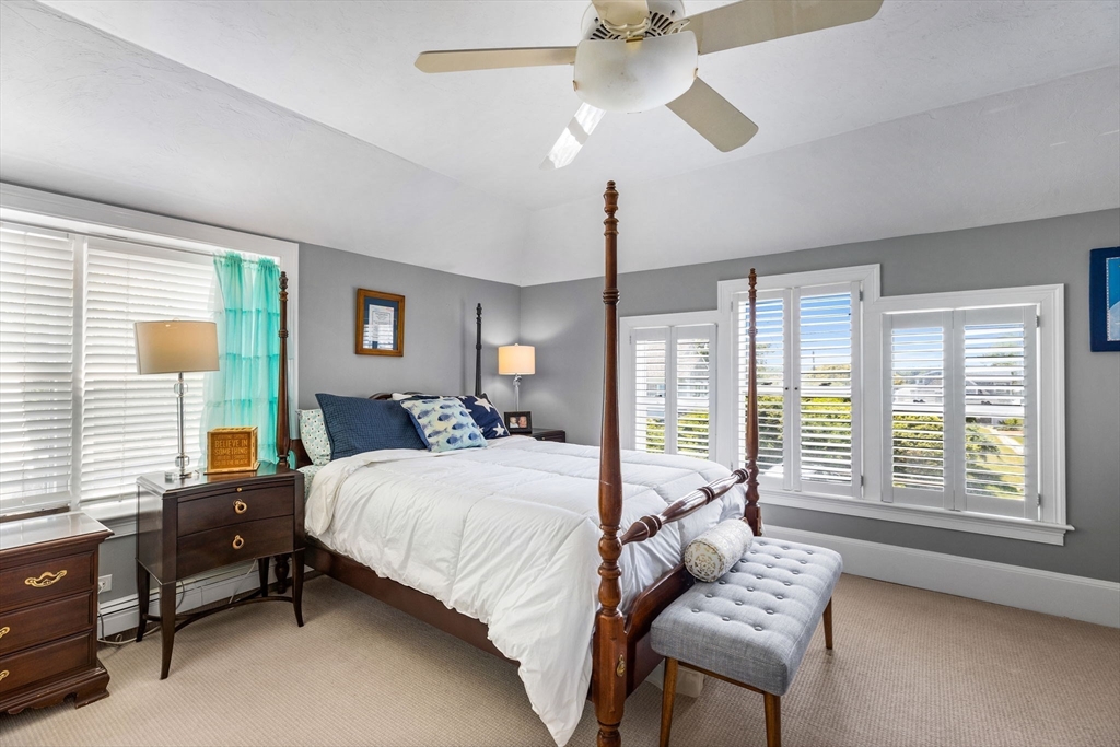 15 Sheldon Road Cohasset, MA 02025 - Photo 33 of 41 a bedroom with a bed and a couch