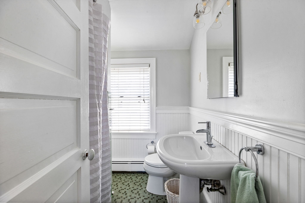 15 Sheldon Road Cohasset, MA 02025 - Photo 34 of 41 a bathroom with a sink a toilet and a bathtub