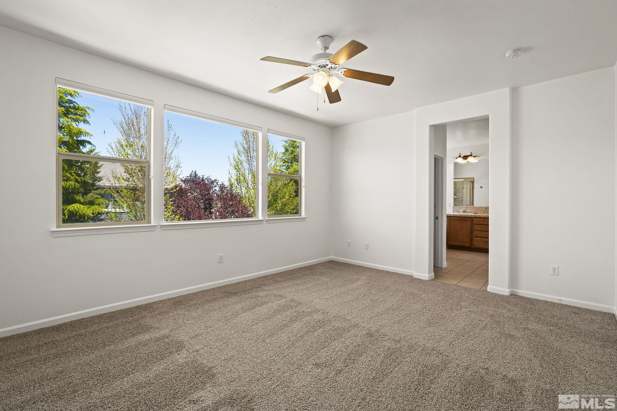 10655 Birch Point Court Reno, NV 89521 - Photo 8 of 19 a view of an empty room with a window