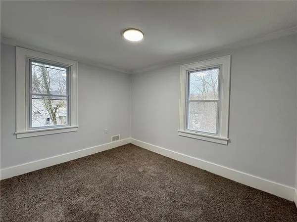 an empty room with a natural light