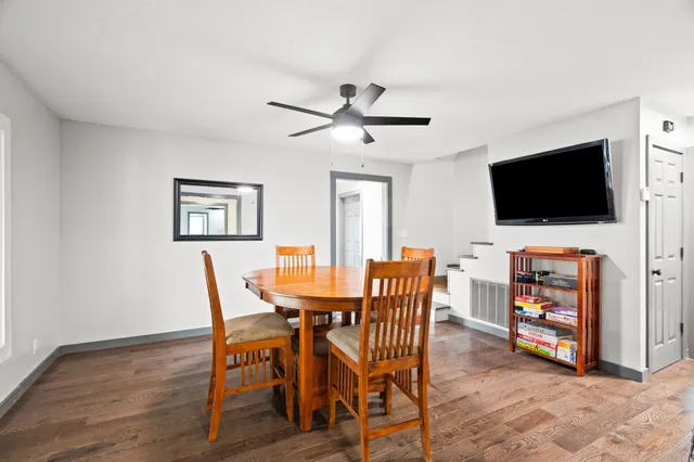 a bathroom with a double vanity sink and mirror