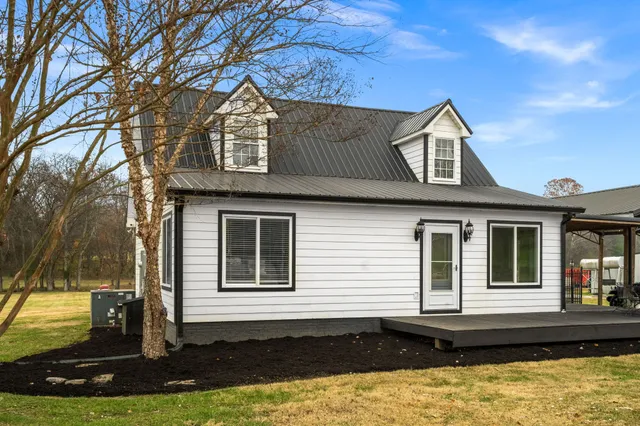 a view of kitchen and empty room