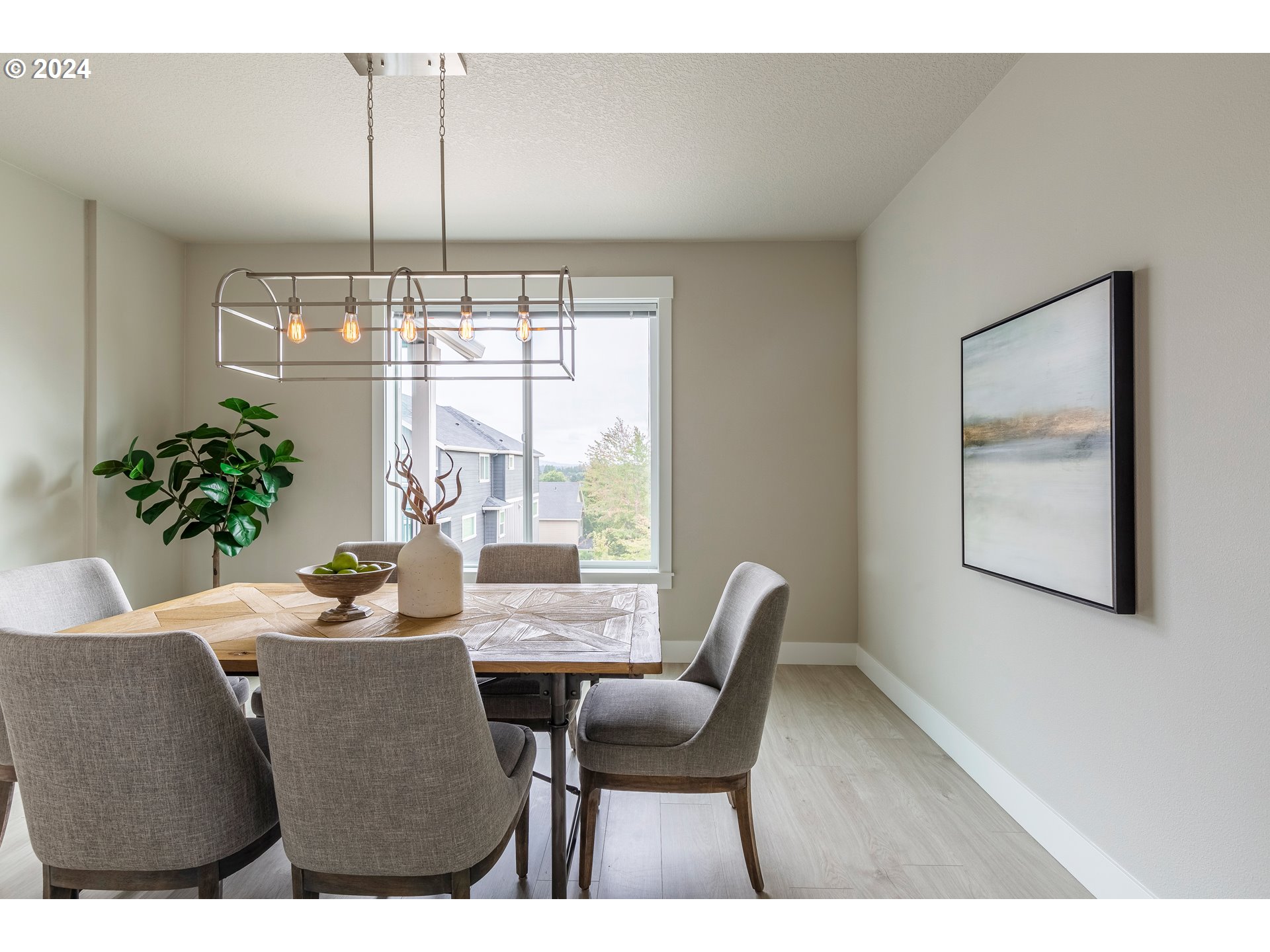 17683 Southwest Cobb Lane Beaverton, OR 97007 - Photo 15 of 27 a dining room with furniture a chandelier and window