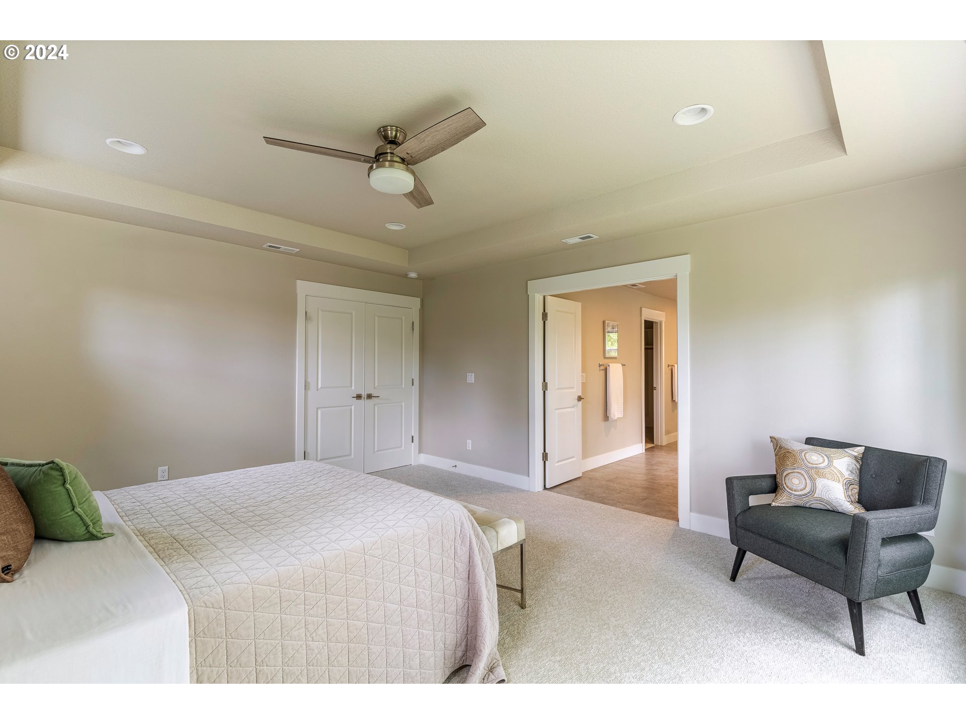 17683 Southwest Cobb Lane Beaverton, OR 97007 - Photo 18 of 27 a bedroom with a bed and a couch