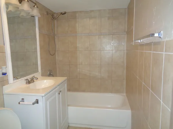 a bathroom with a sink and a bathtub