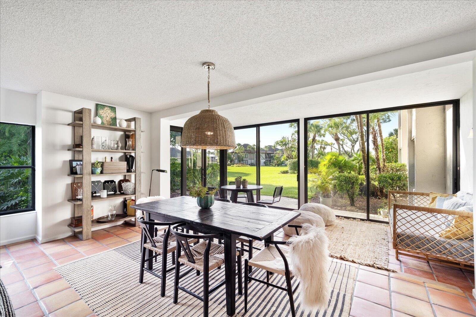 13307 Polo Club Road, Unit C106 Wellington, FL 33414 - Photo 7 of 25 a view of a livingroom with furniture window and outside view