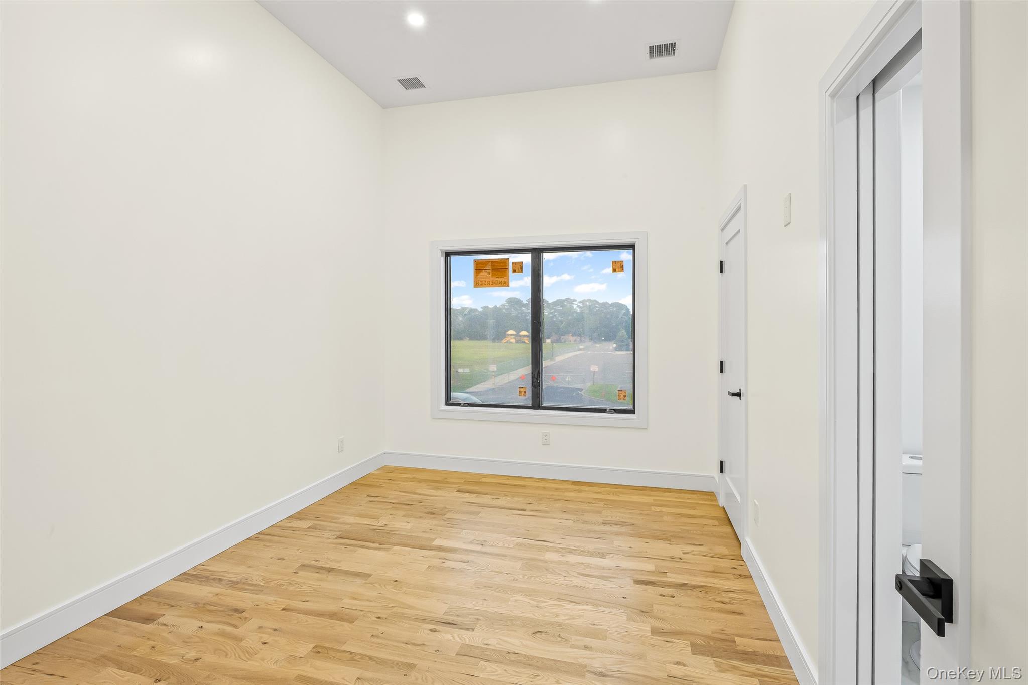 26 Tremont Avenue Patchogue, NY 11772 - Photo 21 of 50 a view of an empty room