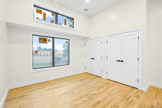 a view of an empty room with cabinet