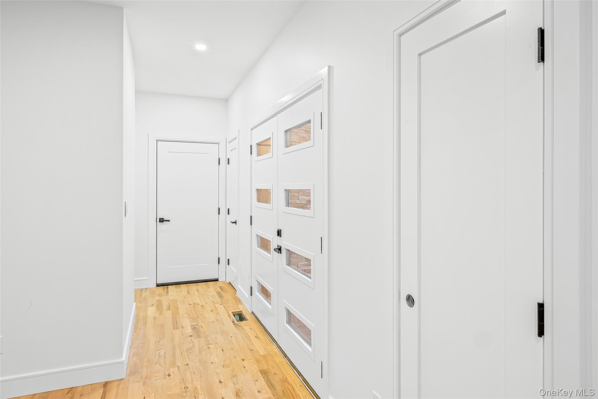 26 Tremont Avenue Patchogue, NY 11772 - Photo 27 of 50 a bathroom with a bathtub and a shower