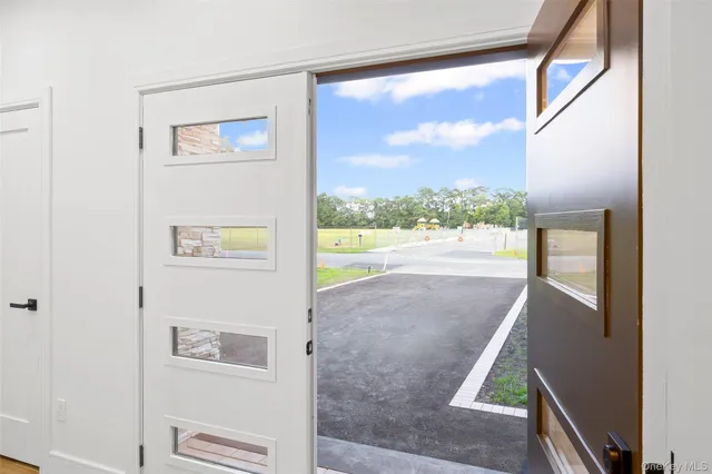 a view of an entryway with a tree
