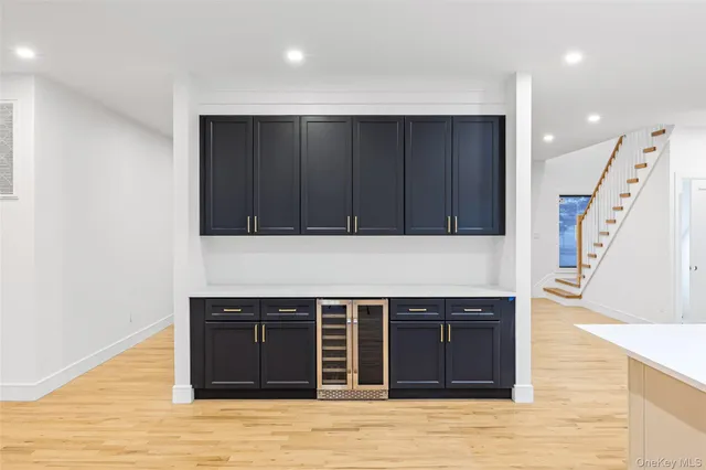 a kitchen with a cabinets and a sink