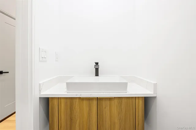 a bathroom with a shower and a shower head